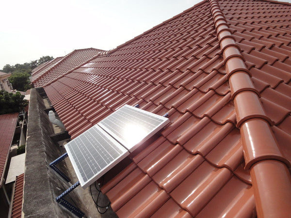 Modular battery modules stacked vertically in a rack-mounted energy storage enclosure